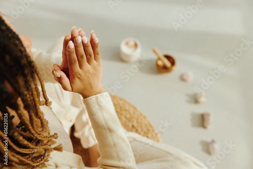 Closeup of female hands during meditation.