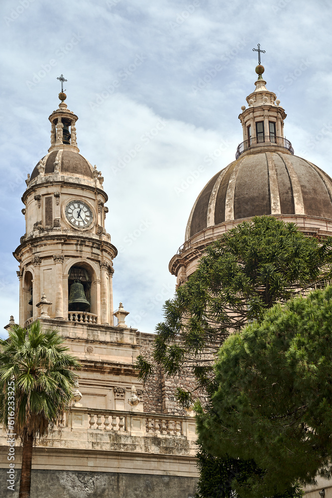 Tower and dome of the Baroque Cathedral Basilica of St. Agates in the city of Catania, on the island of Sicily