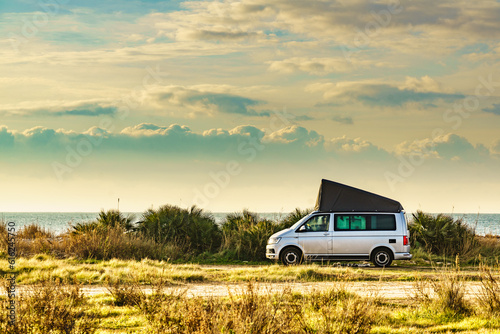 Wallpaper Mural Van with roof top tent camping on nature