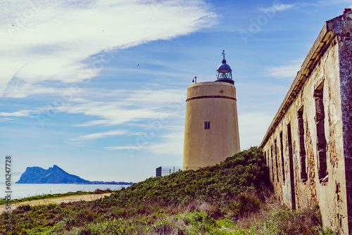 Lighthouse and Gibraltar rock, La Alcaidesa, Spain.