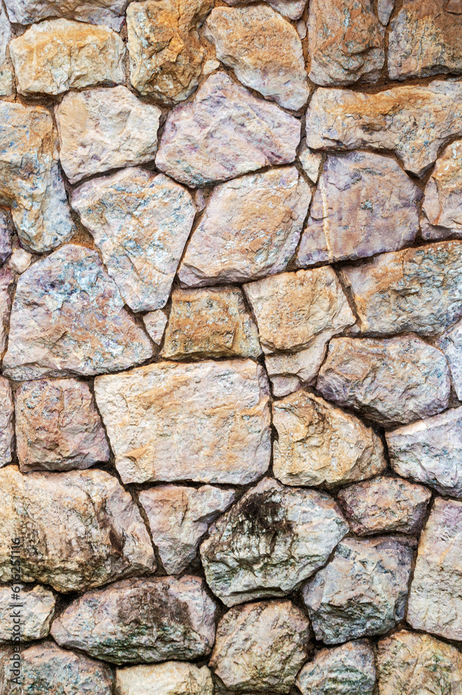 Wall of colored stones. Standard. Advertising space. Design element. Bottom. Wall of colored stones. Standard. Advertising space. Design element. Bottom.