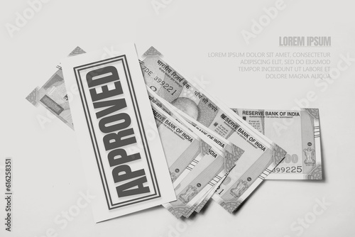 Bank Loan Concept: Indian 500 Rupee Notes with Approval Stamp on White Background, Black and white.