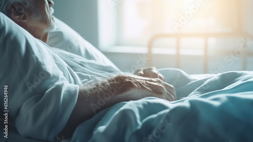 An elderly man in bed in close-up. Elderly care, hospice care. Long-term care for the elderly, rehabilitation