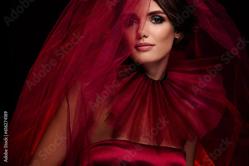High fashion magazine closeup portrait of dark bride lady wear ruby dress lace veil posing tender sensual passionate