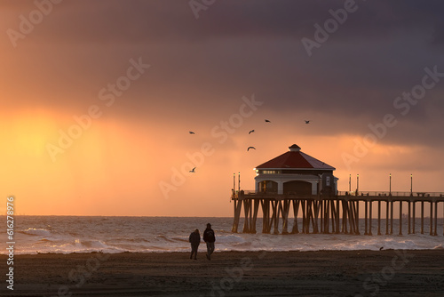 A Sunset walk on Huntington Beach California © rondakimbrow