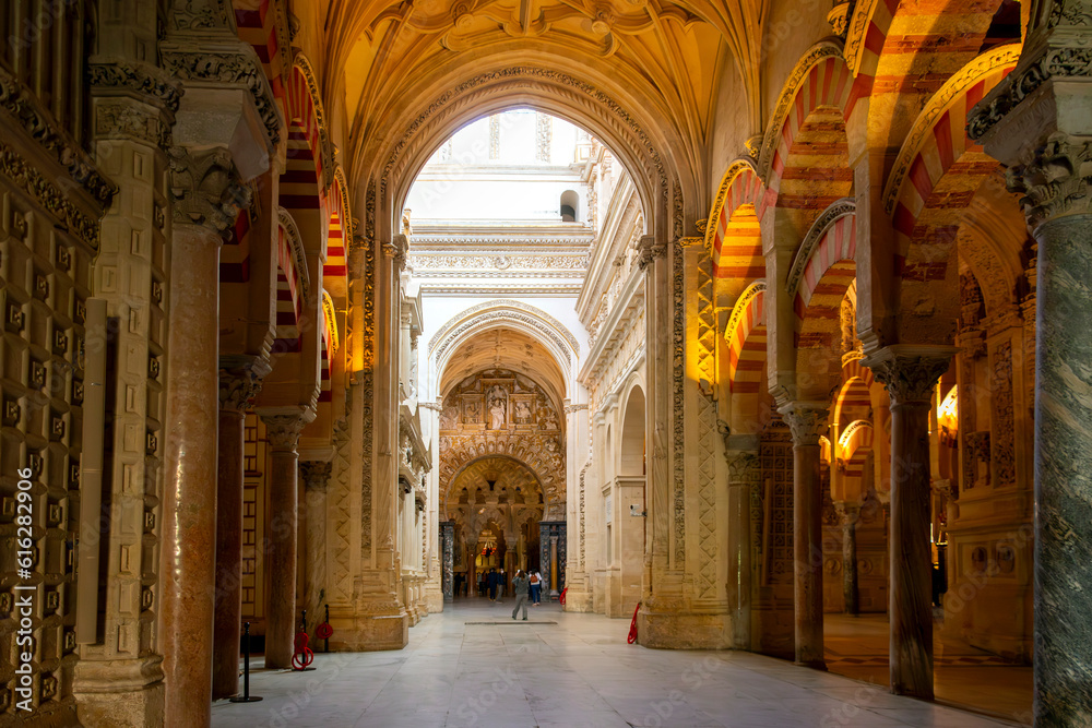 The ornate arched interior entry into the Great Mosque Cathedral Mezquita in the city of Cordoba, Spain, in the Andalusian region.