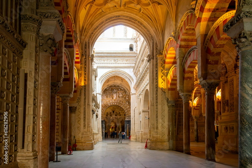 The ornate arched interior entry into the Great Mosque Cathedral Mezquita in the city of Cordoba, Spain, in the Andalusian region.