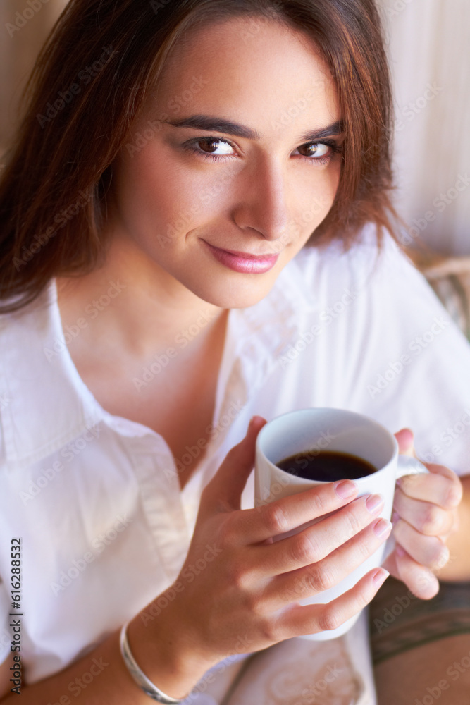 Portrait, woman drink her coffee in the morning and thinking on sofa in the living room of her home. Peace or freedom, mindfulness or relax and female person drinking hot beverage for stress relief Portrait, woman drink her coffee in the morning and thinking on sofa in the living room of her home. Peace or freedom, mindfulness or relax and female person drinking hot beverage for stress relief