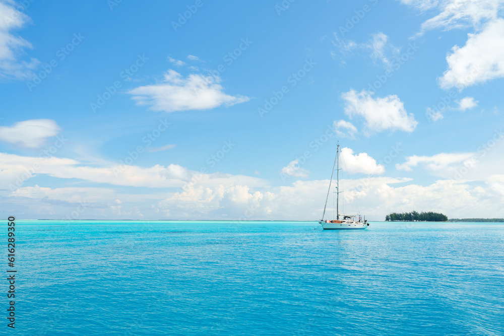 A sail boat in Bora Bora, French Polynesia A sail boat in Bora Bora, French Polynesia