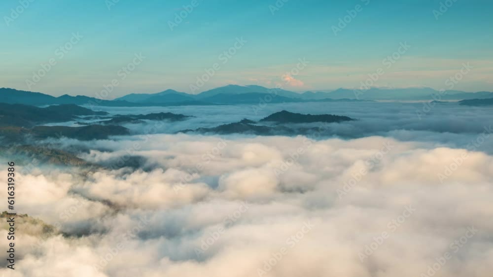timelapse close-up with tele scope on foggy in golden time morning with colorful cloud on top of moutain thailand famous tourist attraction best of viewpoint. timelapse close-up with tele scope on foggy in golden time morning with colorful cloud on top of moutain thailand famous tourist attraction best of viewpoint.