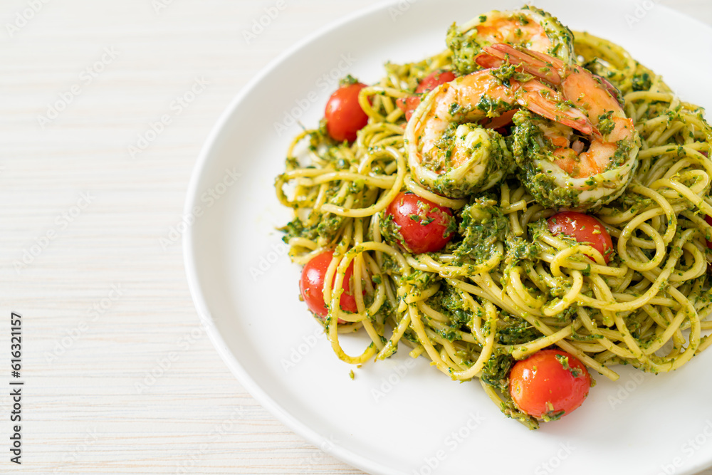 Spaghetti with prawns or shrimps in homemade pesto sauce Spaghetti with prawns or shrimps in homemade pesto sauce