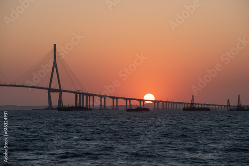 bridge and sunset over the sea 