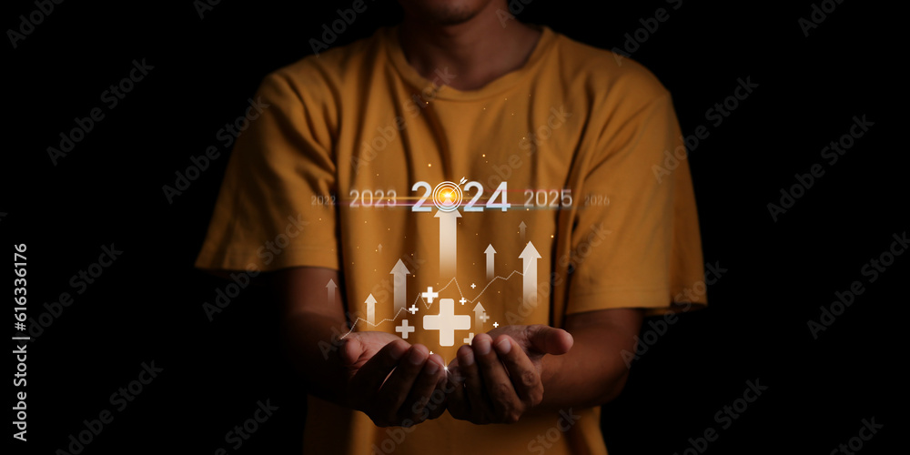 Countdown to 2024 concept. the taps a virtual download bar with a ...