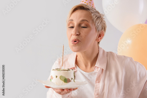 Mature woman with birthday ...
