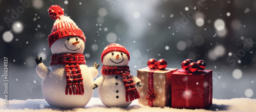 Cute christmas snowmen with presents in the snow on a bokeh background, generative ai © GeertJan