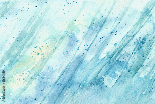 Hand drawn watercolor textured background with spots, dots, lines and splashes in yellow and blue colors as design element. Abstract backdrop with copy space