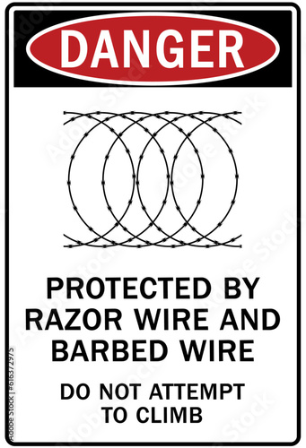 Razor wire hazard warning sign and labels protected by barbed wire and razor wire. Do not attemp to climb photo