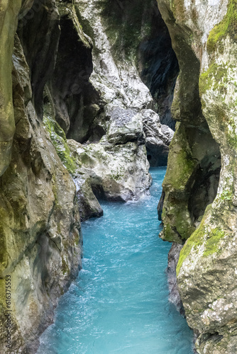 Crystal clear Soca river  one of the most beautiful european rivers  deep in the rocky canyon of slovenian Alps