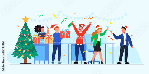 Business people celebrating Christmas and New Year holiday on corporate party in business office.