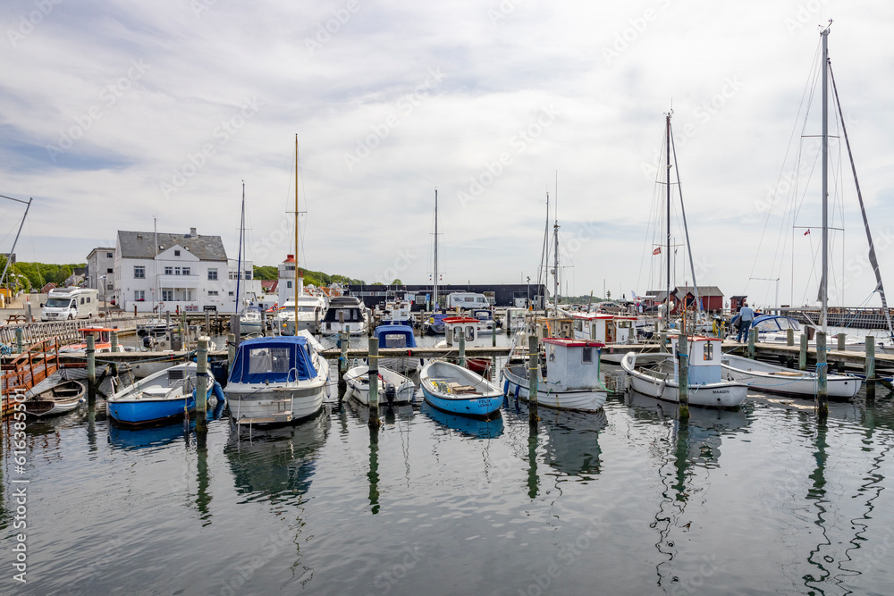 Visit to Lohal's harbor with many fishing boats and leisure boats in Langeland, Denmark