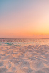 Papier peint photo Corail Closeup beach coast sand texture with warm gold orange sunset light. Fantasy beach landscape sky sea bay. Tranquil relax bright horizon, colorful sky. Peaceful nature seascape. Summer Mediterranean  © icemanphotos