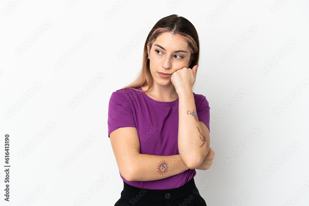 Young caucasian woman isolated on white background with tired and bored expression Young caucasian woman isolated on white background with tired and bored expression