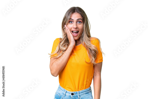 Young Uruguayan woman over isolated background with surprise and shocked facial expression photo