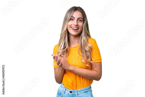 Young Uruguayan woman over isolated background laughing photo