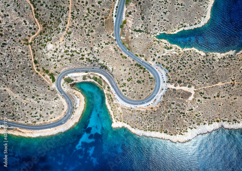 Fototapeta Naklejka Na Ścianę i Meble -  Panoramic aerial view of the popuar Limanakia bays in Vouliagmeni, Athens, Greece, with little bays and turquoise sea for tourists and locals