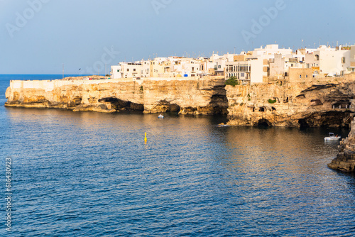 grotte di polignano a mare al tramonto, estate - Bari, Puglia, Italia