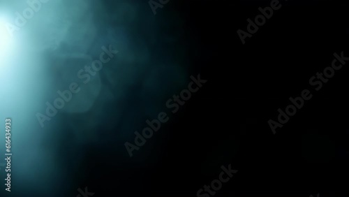 Video transition, through moving light beam from right to left, with blue bokeh reflections with light leaks.