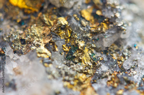 Ore close-up. Nugget. Crystals. Golden backgrounds. Gold