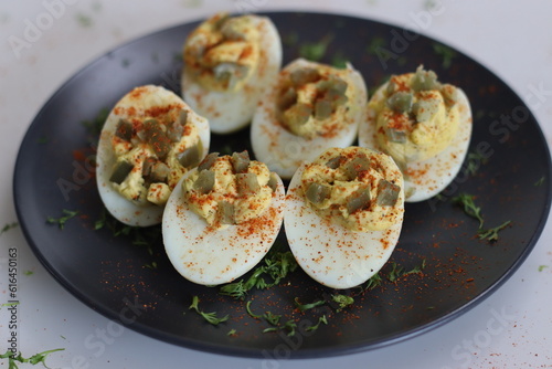 Stuffed eggs. Hard boiled eggs cut into half and stuffed with a paste made with egg yoks, mixed with mayonnaise and mustard