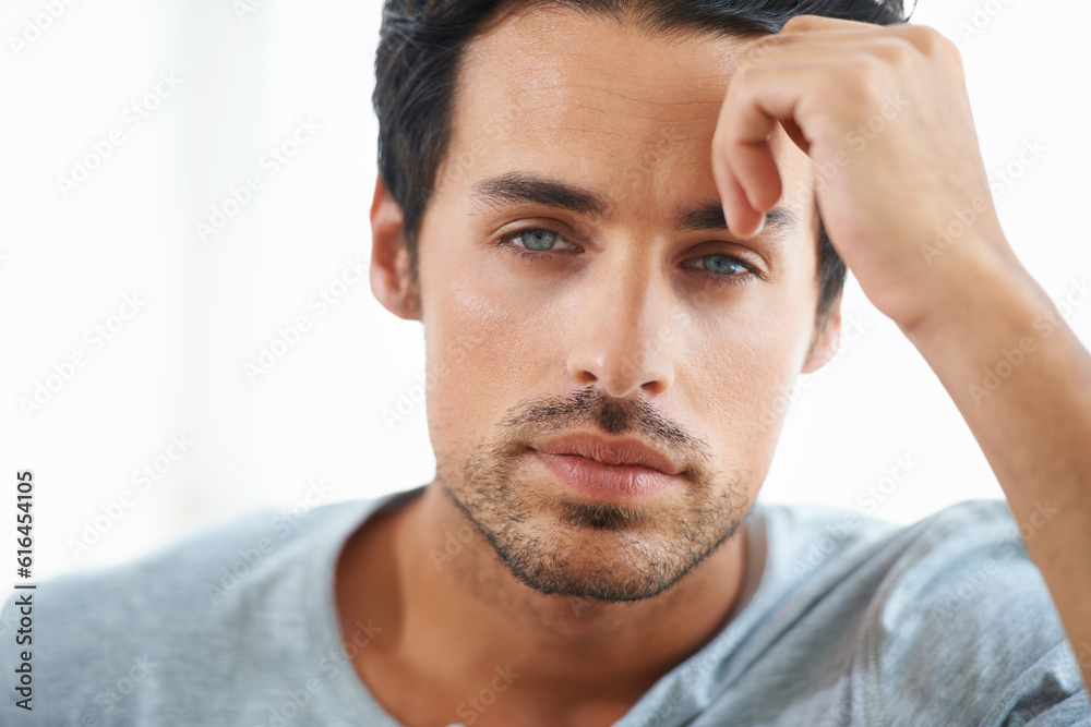 Serious man, closeup and face of handsome model or resting hand on head on isolated and white background. Portrait of Spanish male person, clean skin or facial aesthetic with confidence and blue eyes Serious man, closeup and face of handsome model or resting hand on head on isolated and white background. Portrait of Spanish male person, clean skin or facial aesthetic with confidence and blue eyes