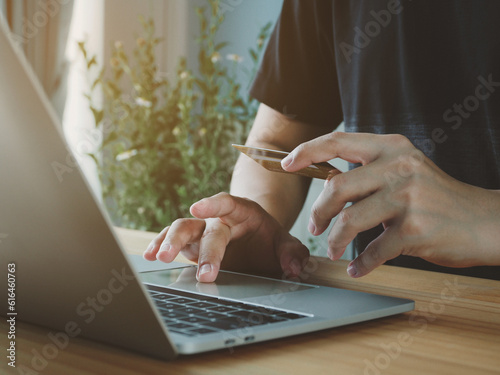 Enter credit card information to pay for goods. online transaction on laptop