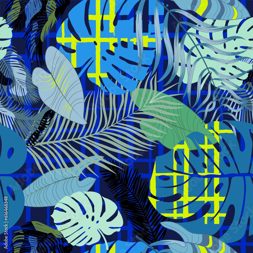 Seamless pattern of large leaves of monstera and palms.