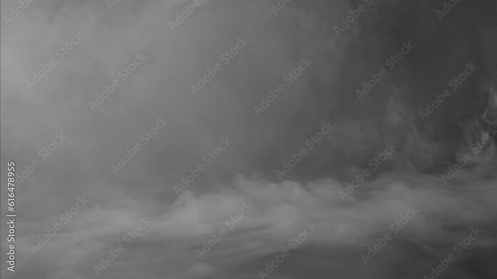 Abstract white smoke in slow motion. Smoke, Cloud of cold fog in light spot background. Light, white, fog, cloud, black background, 4k, ice smoke cloud. Floating fog.