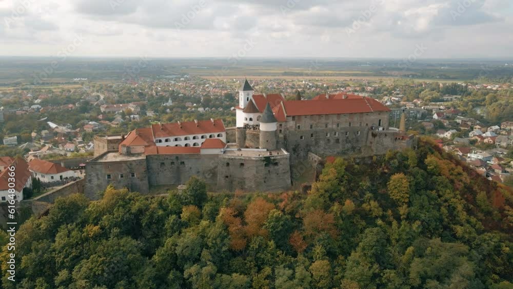 Panoramic aerial view to Palanok Castle of Mukachevo. Historic castle in western Ukraine. Panoramic aerial view to Palanok Castle of Mukachevo. Historic castle in western Ukraine.
