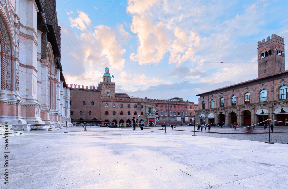 Bologna, Italy. Piazza Maggiore with Torre dell'Orologio and Torre dell’Arengo, landmark in Emilia-Romagna historical province