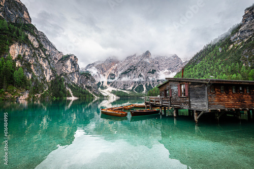 Beautiful Braies Lake ( Pragser Wildsee )with cloudy sky in Dolomites mountains, Sudtirol, Italy. Lake Braies is also known as Lago di Braies.