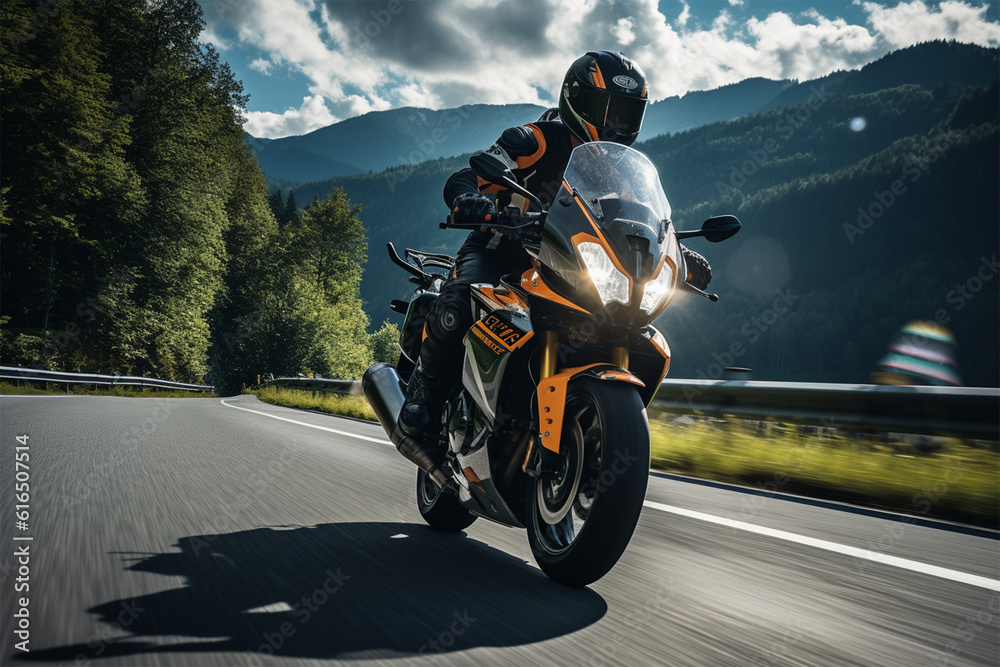 Obraz premium Motorcycle driver on an Alpine freeway