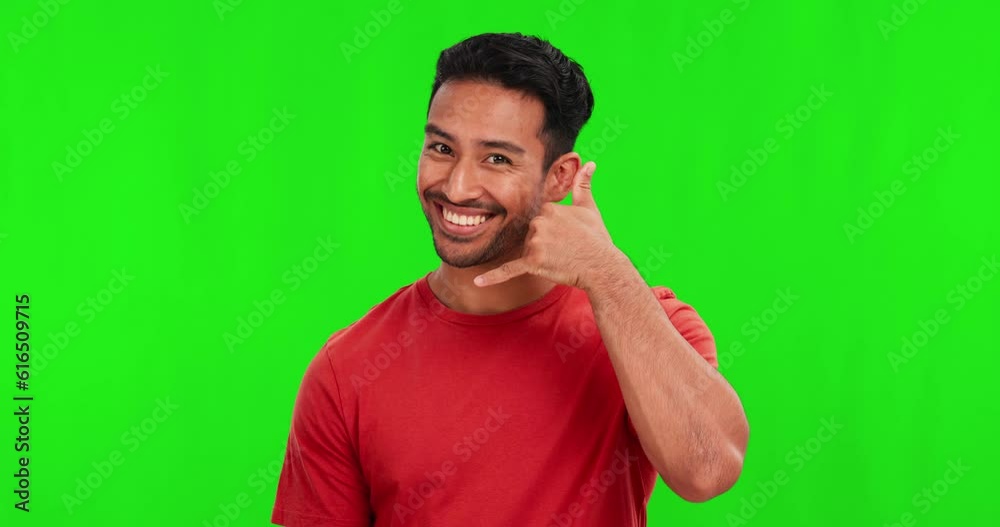 Call, happy and man in a studio with green screen for communication, contact or phone gesture. Happiness, smile and portrait of a male model with a mobile expression isolated by chroma key background Call, happy and man in a studio with green screen for communication, contact or phone gesture. Happiness, smile and portrait of a male model with a mobile expression isolated by chroma key background