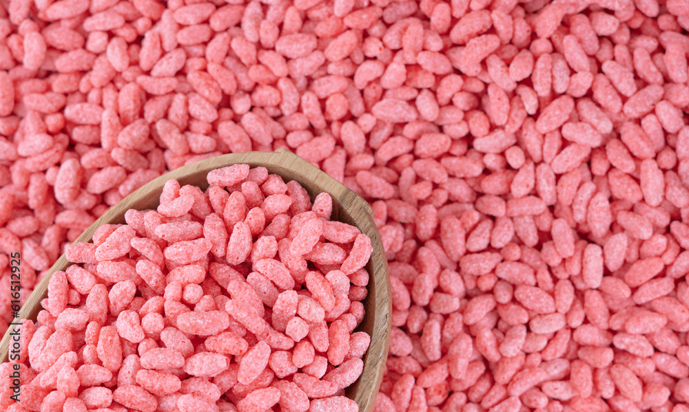 Strawberry flavored rice, corn and wheat cereal background. Crispy puffed pink rice. Delicious and nutritious strawberry-flavored Strawberry flavored rice, corn and wheat cereal background. Crispy puffed pink rice. Delicious and nutritious strawberry-flavored