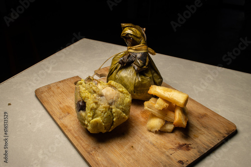 THE JUANE, TYPICAL FOOD OF THE PERUVIAN AMAZON, IS CONSUMED IN THE TRADITIONAL CELEBRATION OF SAN JUAN photo