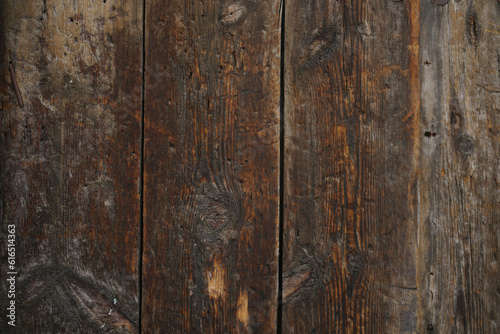 Old brown wooden floor with beautiful texture, vertical lines. front view. Texture of wooden boards. yellow wood panel texture for background, Top view of table or fence