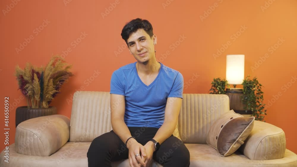The man making cute gestures for the camera. The man making cute gestures for the camera.
