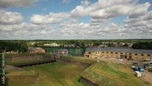 Aerial 4K video from drone to Daugavpils fortress and Daugavpils Mark Rothko Art Centre on a beautiful sunny summer day. Daugavpils, Latvia, Latgale, Europe photo