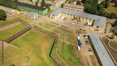 Aerial 4K video from drone to Daugavpils fortress and Daugavpils Mark Rothko Art Centre on a beautiful sunny summer day. Daugavpils, Latvia, Latgale, Europe photo