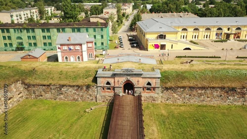 Aerial 4K video from drone to Daugavpils fortress and Daugavpils Mark Rothko Art Centre on a beautiful sunny summer day. Daugavpils, Latvia, Latgale, Europe photo