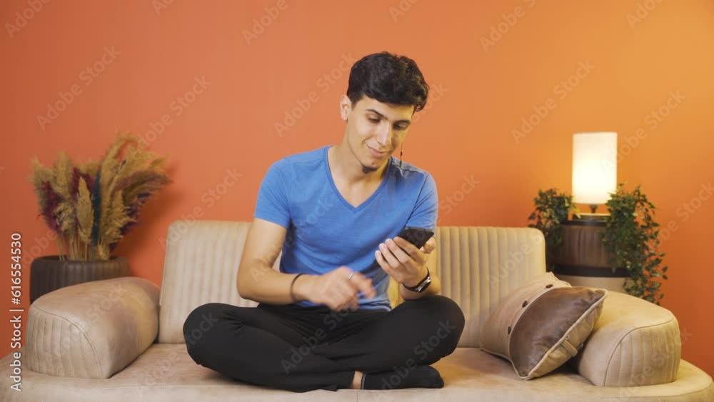 The man who likes the new app. Phone app.